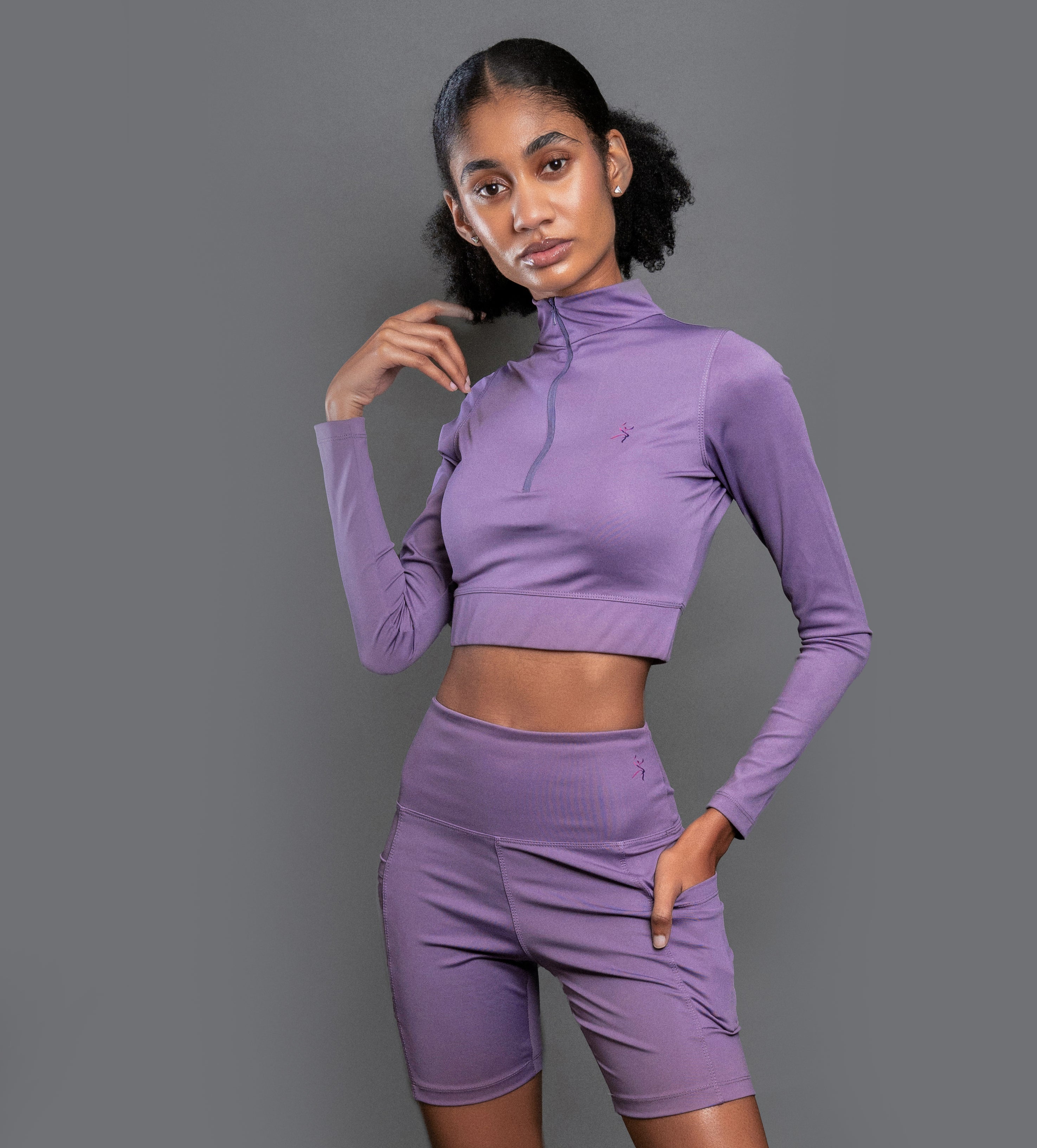 QualiFit limitless luxe Stretch long sleeve half zip-up crop top with high waisted Biker Shorts with double sided pockets 1 set