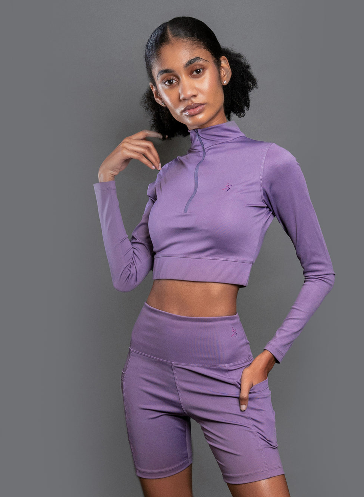 QualiFit Limitless luxe Stretch long sleeve half zip-up crop top with high waisted Biker Shorts with double sided pockets 1 set