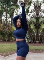 QualiFit Limitless luxe Stretch long sleeve half zip-up crop top with high waisted Biker Shorts with double sided pockets 1 set